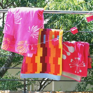 towels hung on steel rod
