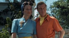  Duke and Duchess of Windsor standing on stone steps.