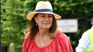 Carole Middleton and Michael Middleton attend day 11 of the Wimbledon Tennis Championships