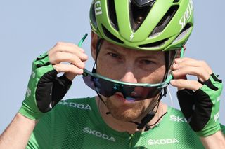 Team Deceuninck rider Irelands Sam Bennett wearing the best sprinters green jersey waits prior to the 19th stage of the 107th edition of the Tour de France cycling race 160 km between BourgenBresse and Champagnole on September 18 2020 Photo by KENZO TRIBOUILLARD AFP Photo by KENZO TRIBOUILLARDAFP via Getty Images