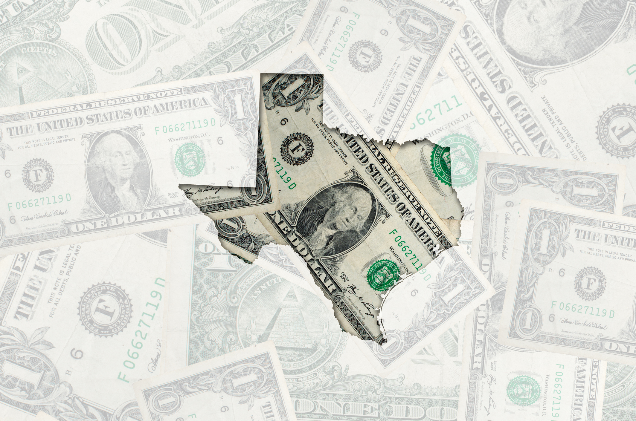 Outlined map of Texas with transparent background of US dollar banknotes