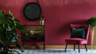 Burgundy living room with mirror