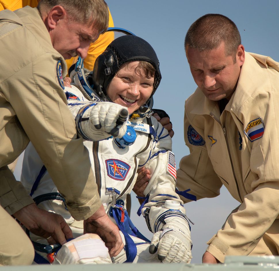 Soyuz Capsule Returns Station Crew to Earth After 204 Days in Space