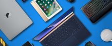 Laptops and Devices on Blue Background