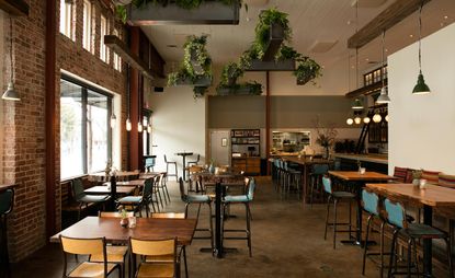 Befitting of a restaurant that emphasises clean eating and sustainable agriculture, The Drawing Board furnishes a stripped-down space with entirely reclaimed or recycled materials