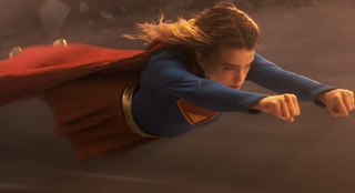 a female superhero in full flight