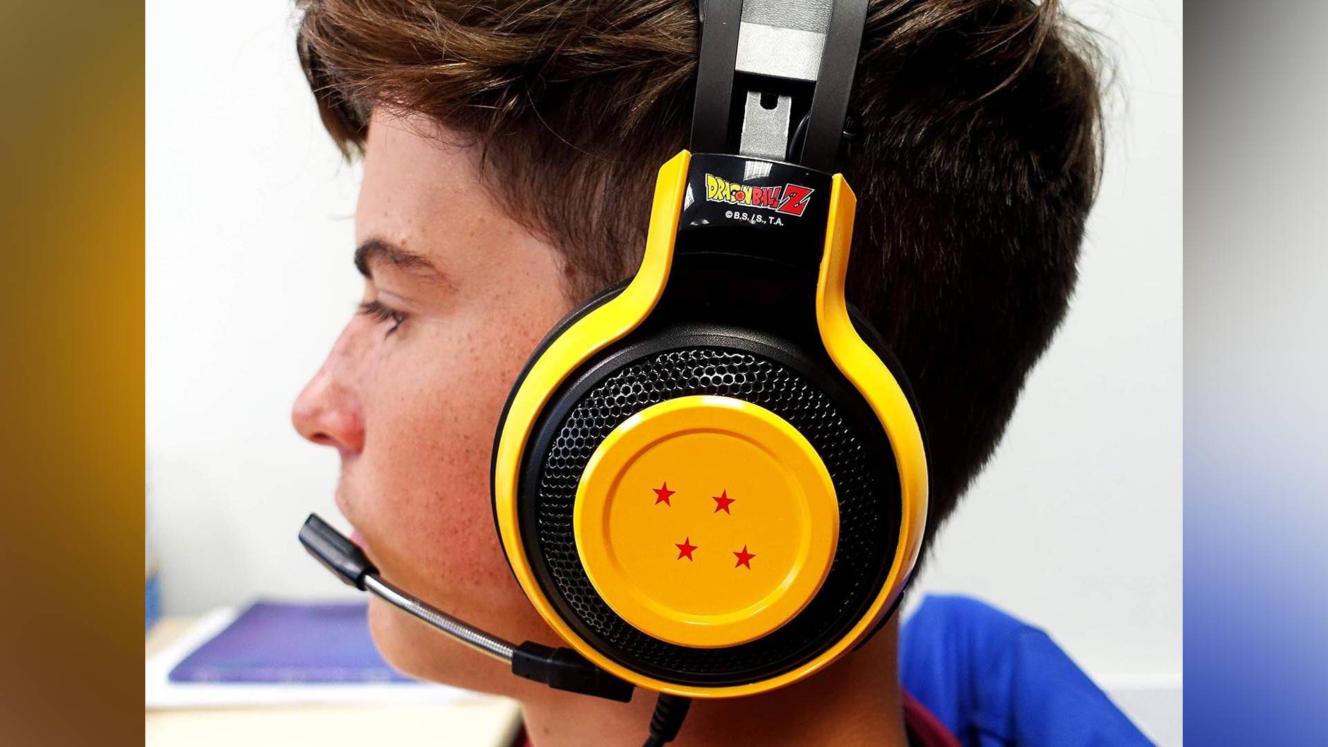 Official promo image of a child wearing the Teknofun Dragon Ball Z gaming headphones.