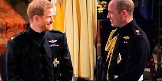 Princes Harry and William in military dress uniform.