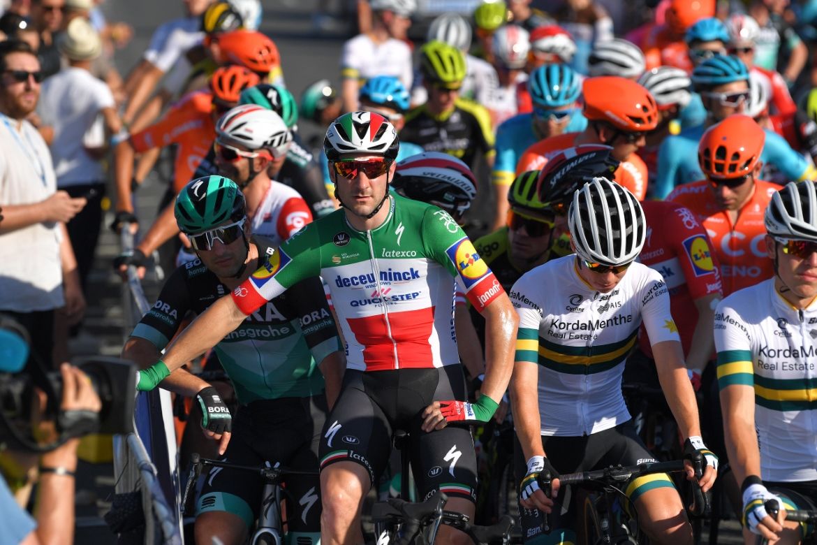 Elia Viviani waits for the start of the race
