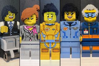The minifigure members of the Lego Space Team, including program manager Daniel, flight director Maria, mission specialist Kyle, scientist Sofie and ground systems technician Zach appear as Lego brick-built statues in the Kennedy Space Center Visitor Complex's Build to Launch exhibit.