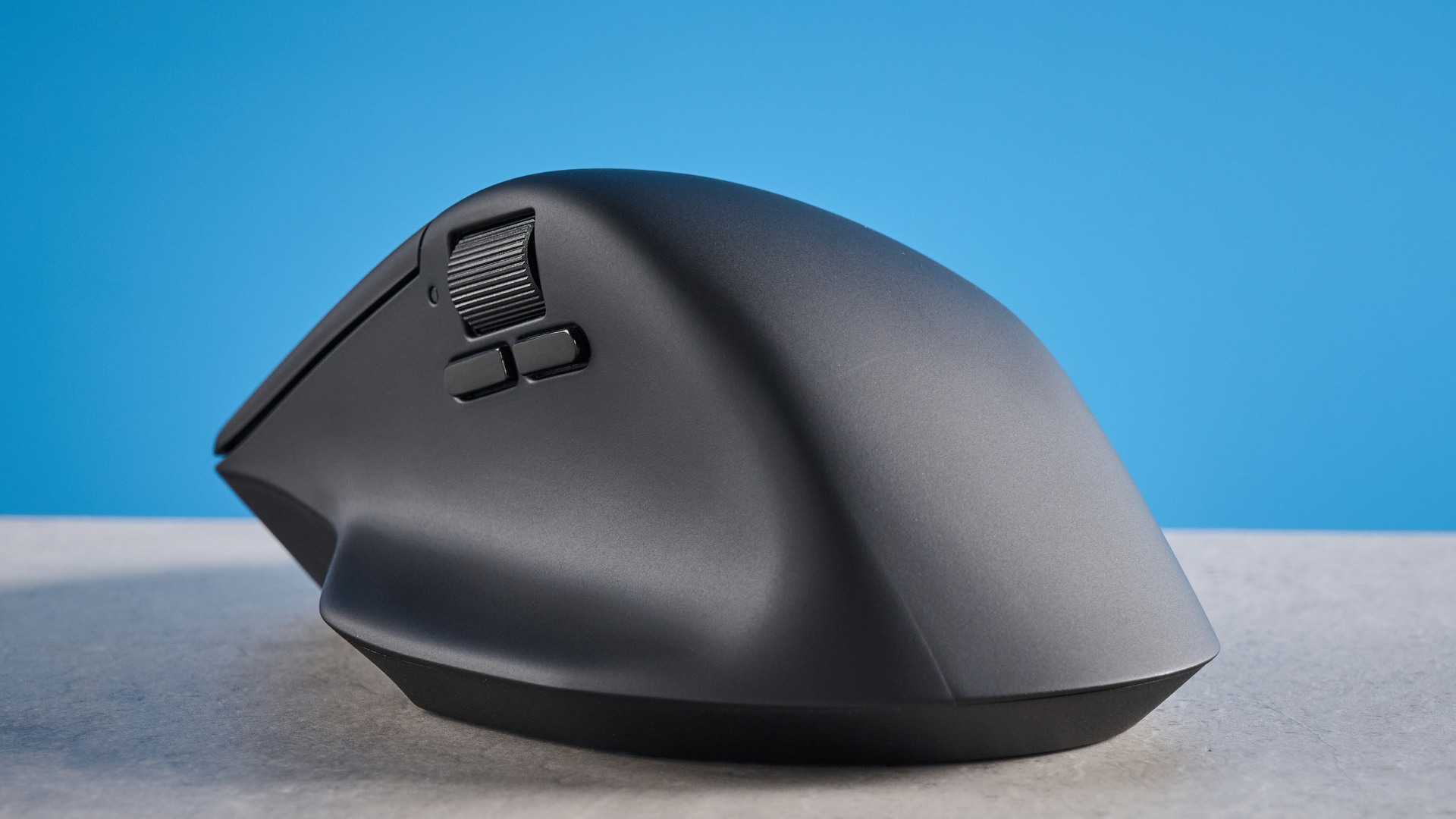 A black Keychron M6 8K ergonomic mouse