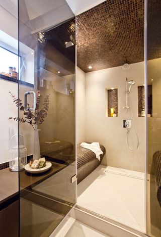 close up of the steam room and shower area in a luxury bathroom