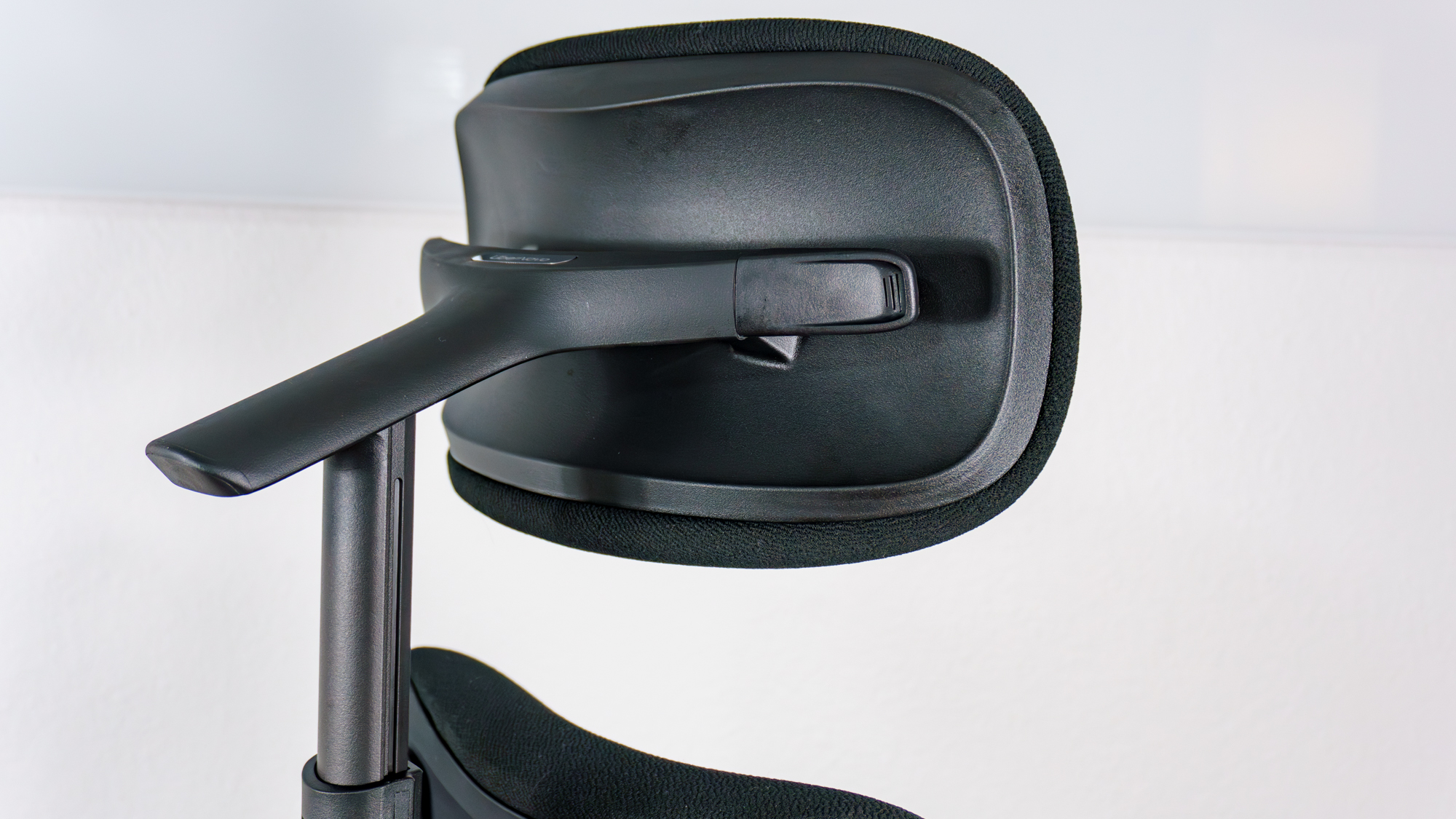 A close-up shot of the LiberNovo Omni SE's headrest seen from the back