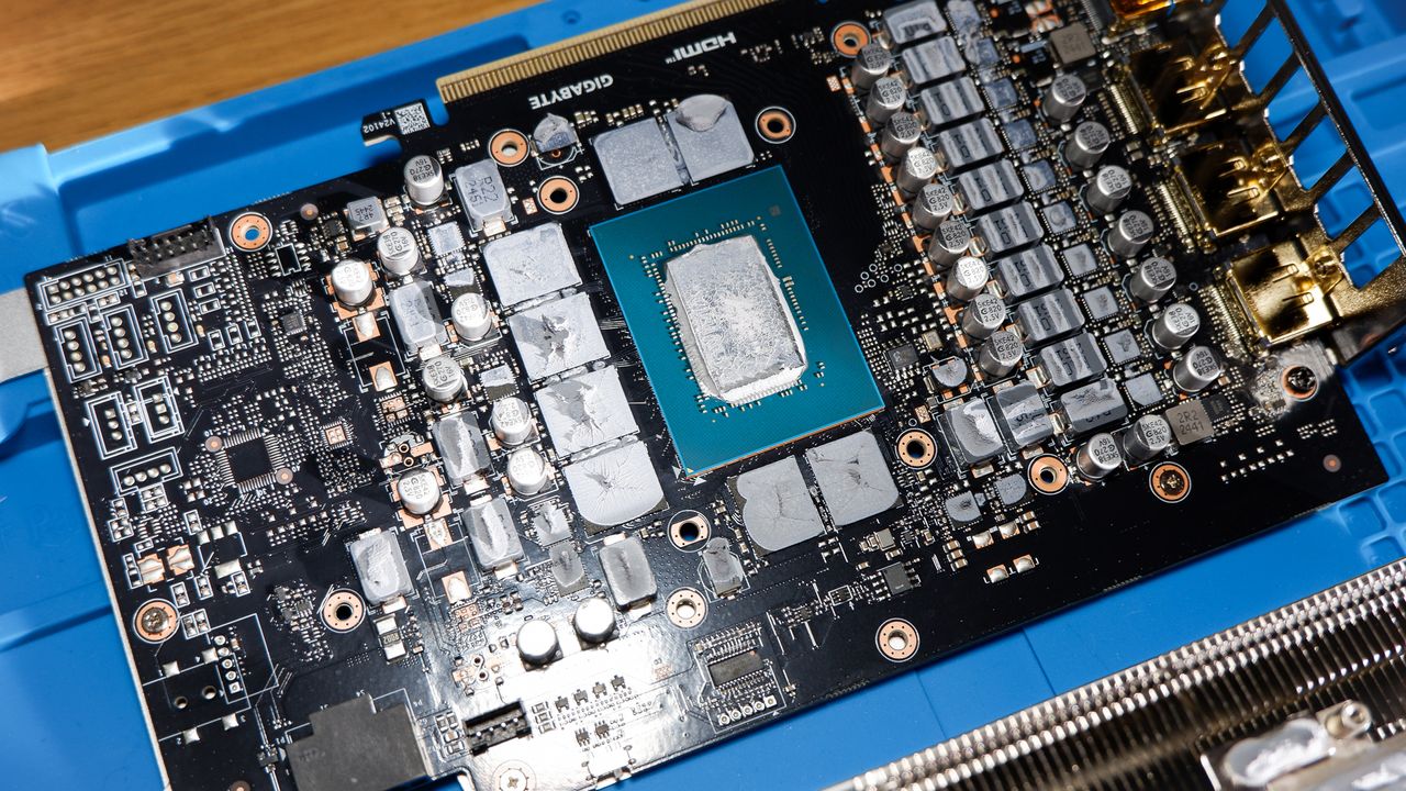 A Gigabyte RTX 5070 Ti Eagle OC Ice on a desk and installed in a gaming PC.