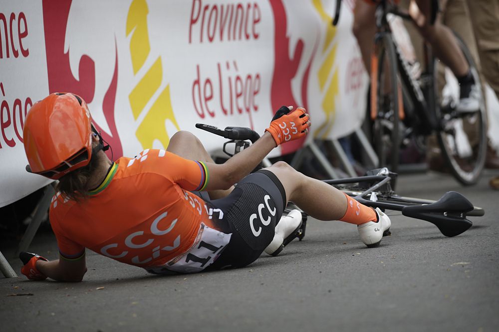 Marianne Vos (CCC_Liv) collapses at the finish line of Fleche Wallonne
