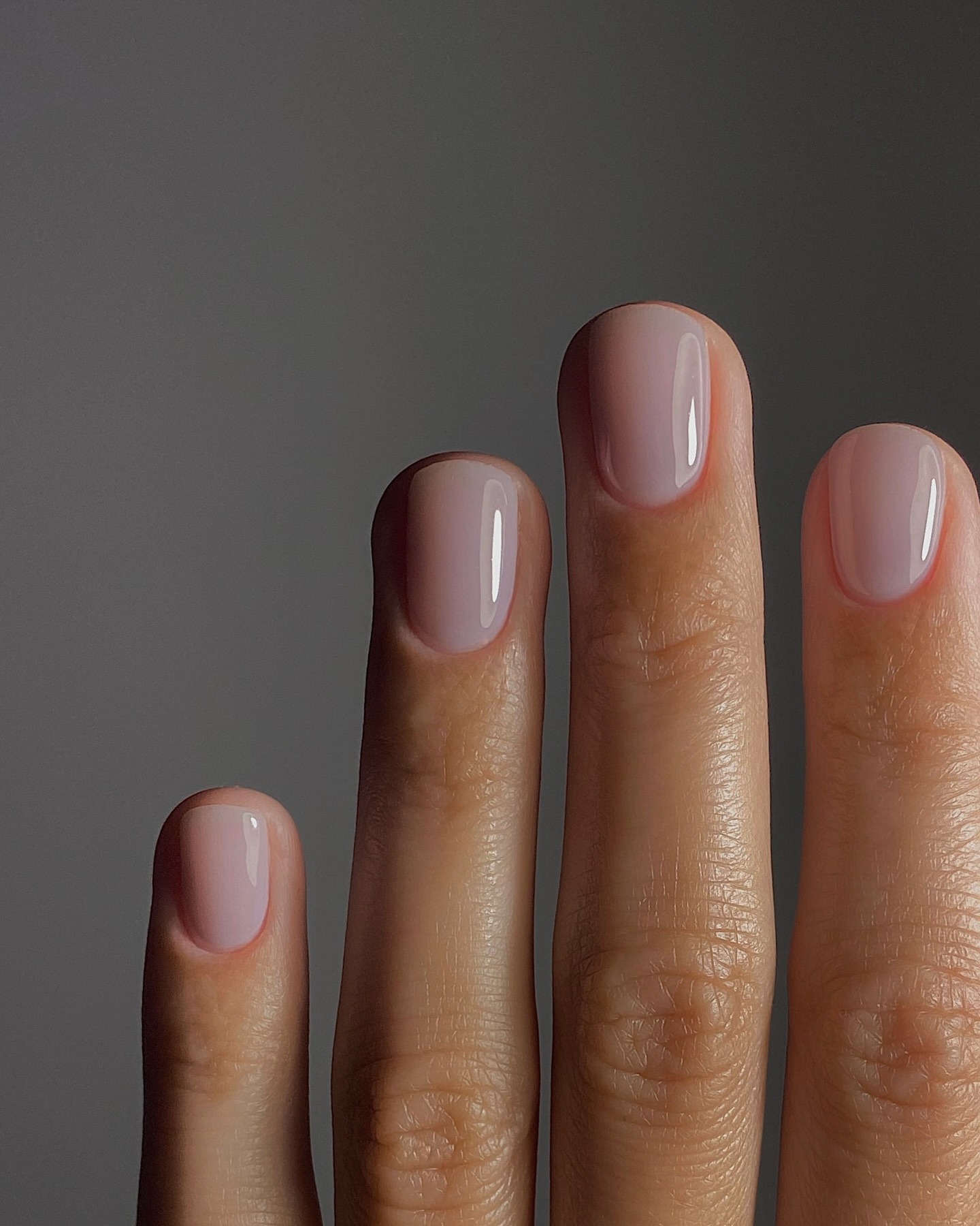 Short nails with sheer lavender tulle nail colour