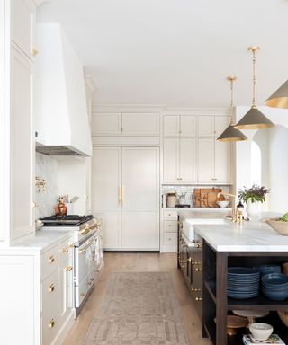 An image of Shea McGee's black, white and beige kitchen