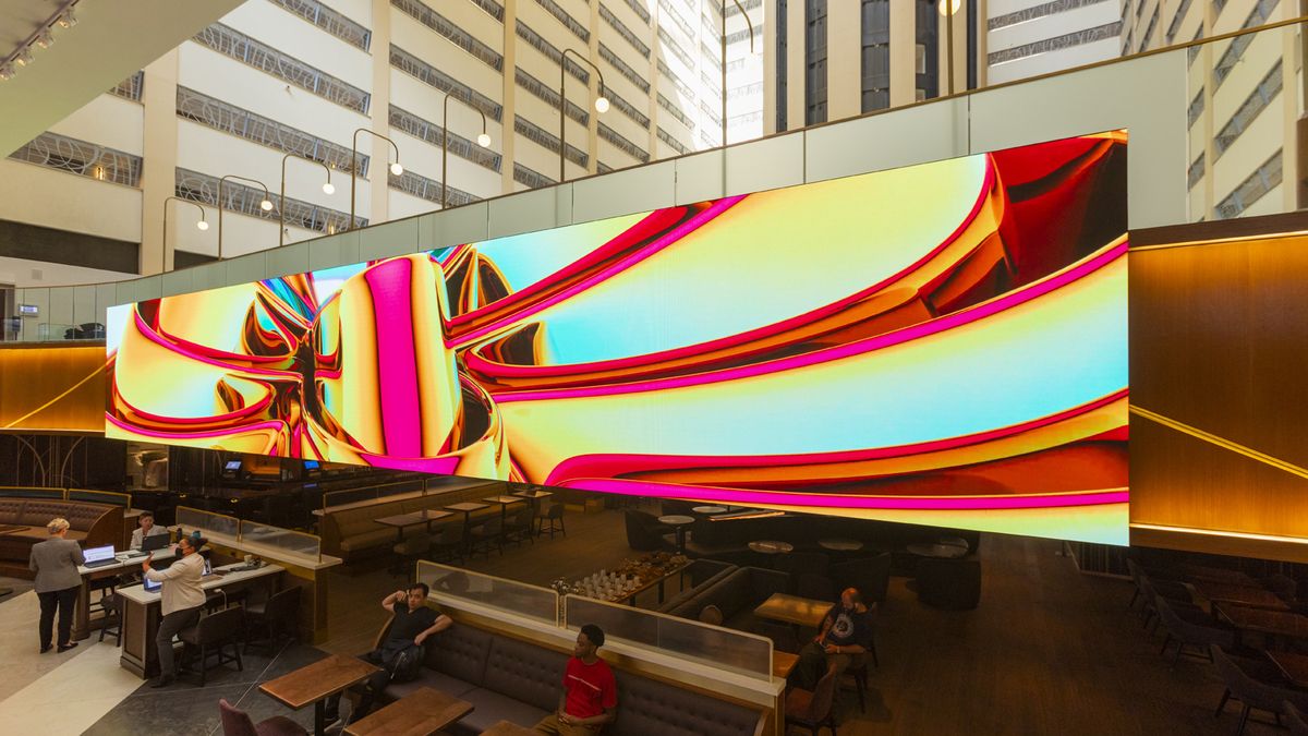 An LG LED display lights up Times Square in blue, red and yellow.