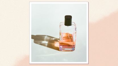 A close up of a half-full perfume bottle with orangey liquid inside and the bottle's silhouette displayed on a grey-ish backdrop/ in a cream and peach gradient template 