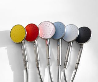 Six Hai showerheads lined up on a white background