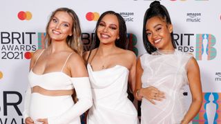 Perrie Edwards, Jade Thirlwall and Leigh-Anne Pinnock of Little Mix pose in the media room during The BRIT Awards 2021 at The O2 Arena on May 11, 2021 in London, England.