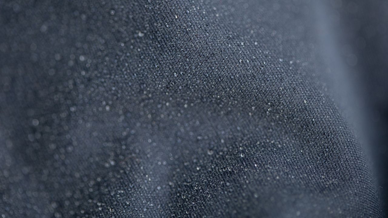 Softshell jacket with water on the surface