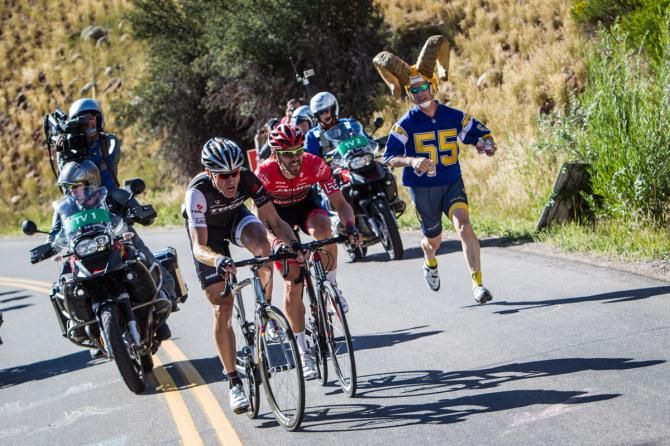 Voigt and Jacques-Maynes try to out-run the fans