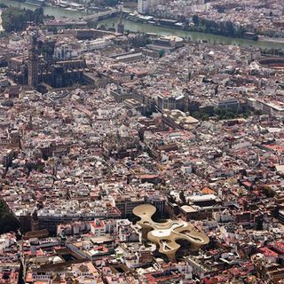 A view of the parasol from the air, surrounded by a cityscape