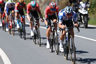 LACRUZDELINARES SPAIN SEPTEMBER 14 Remco Evenepoel of Belgium and Team Soudal Quick Step Polka dot Mountain Jersey competes in the breakaway prior to the 78th Tour of Spain 2023 Stage 18 a 1789km stage from Pola de Allande to La Cruz de Linares 840m UCIWT on September 14 2023 in La Cruz de Linares Spain Photo by Tim de WaeleGetty Images