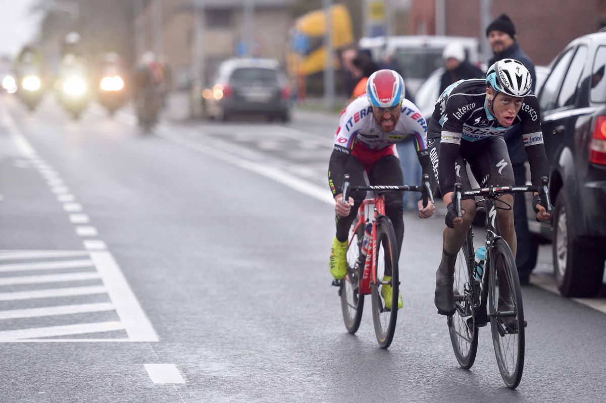 Luca Paolini (Katusha) sits on Niki Terpstra's (Etixx-Quick Step) wheel