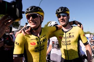 Stage 9 winner Olav Kooij celebrates with his Visma-Lease a Bike teammate