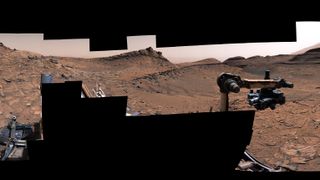 A portion of a panorama taken by the Mars Curiosity rover of the "Marker Band" section of Mount Sharp.