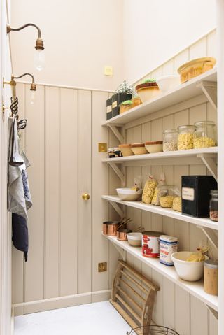 A pantry tucked on a wall