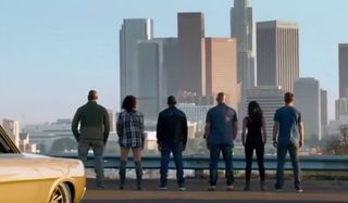 Fast & Furious crew with backs to camera