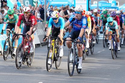 Alpecin - Premier Tech Australian rider Jensen Plowright (R) reacts as he wins Stage 2 of PostNord Danmark Rundt ahead of Team Visma | Lease a Bike's Belgian rider Wout Van Aert (C) during the PostNord Denmark Tour on July 30, 2026 in Skive, Denmark. The stage 2 is 187.2 kilometers long and runs from Glyngoere to Skive. (Photo by Henning Bagger / Ritzau Scanpix / AFP via Getty Images) / Denmark OUT