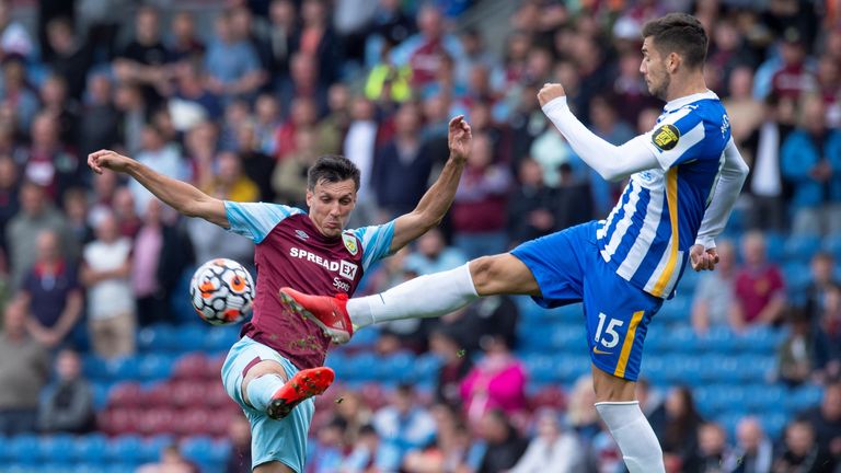 Jack Cork of Burnley and Jakub Moder of Brighton & Hove Albion in action during the Premier League match between Burnley and Brighton & Hove Albion at Turf Moor