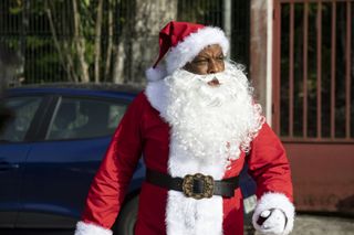 Commissioner Selwyn Patterson in his Santa gear in the Death in Paradise Christmas special