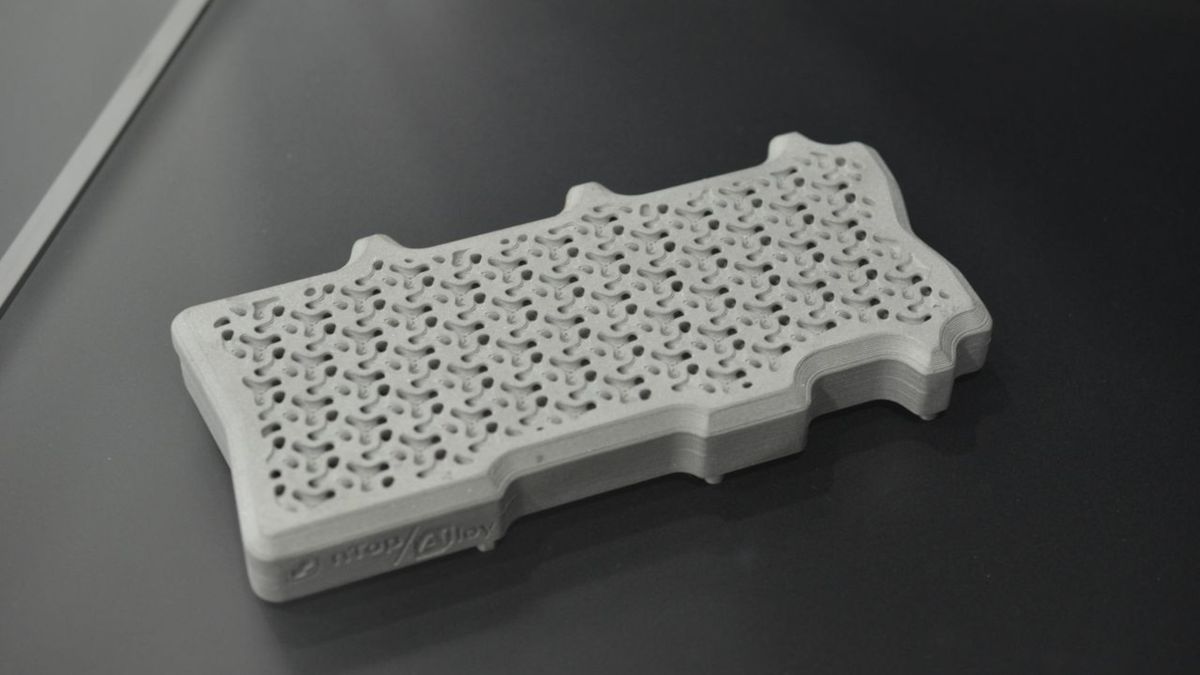 A photo of a custom cold plate for an Nvidia H100, designed and manufactured by Alloy Enterprises, after modelling the optimal fluid flow by nTop