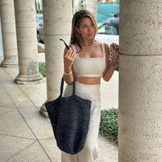 Image of Sandra Bruno posing in a linen matching set.