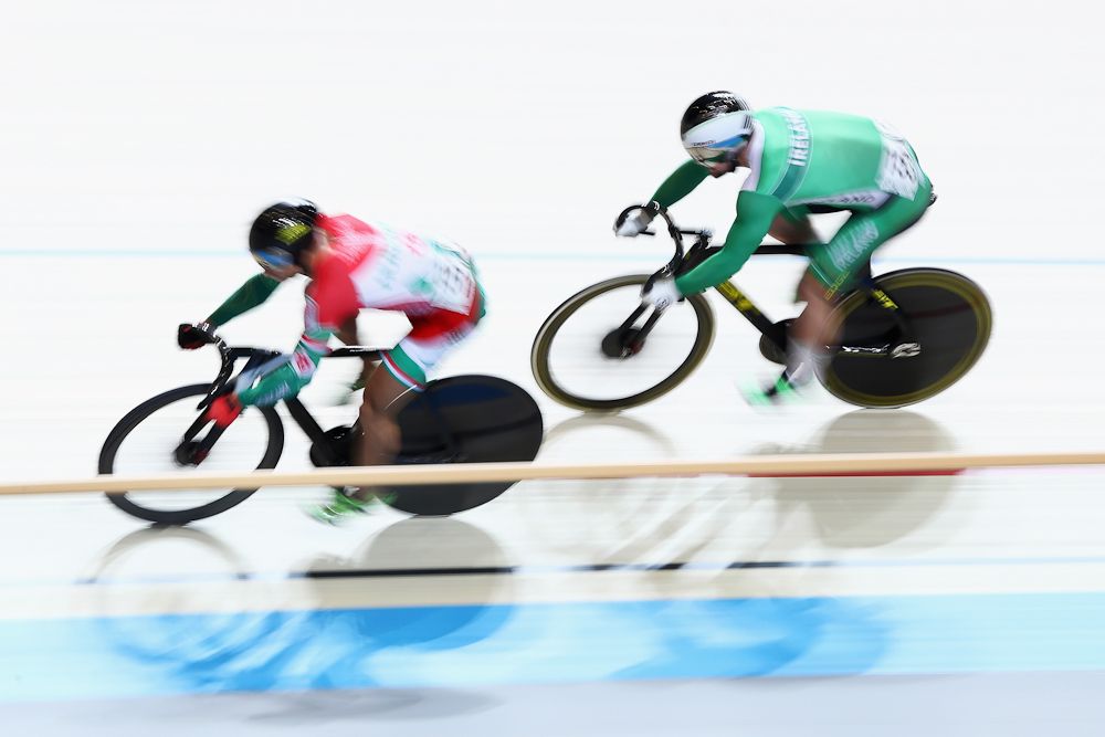 Sandor Szalontay (L) of Hungary and Eoin Mullen of Ireland compete in the Men's Sprint 1/16 Finals