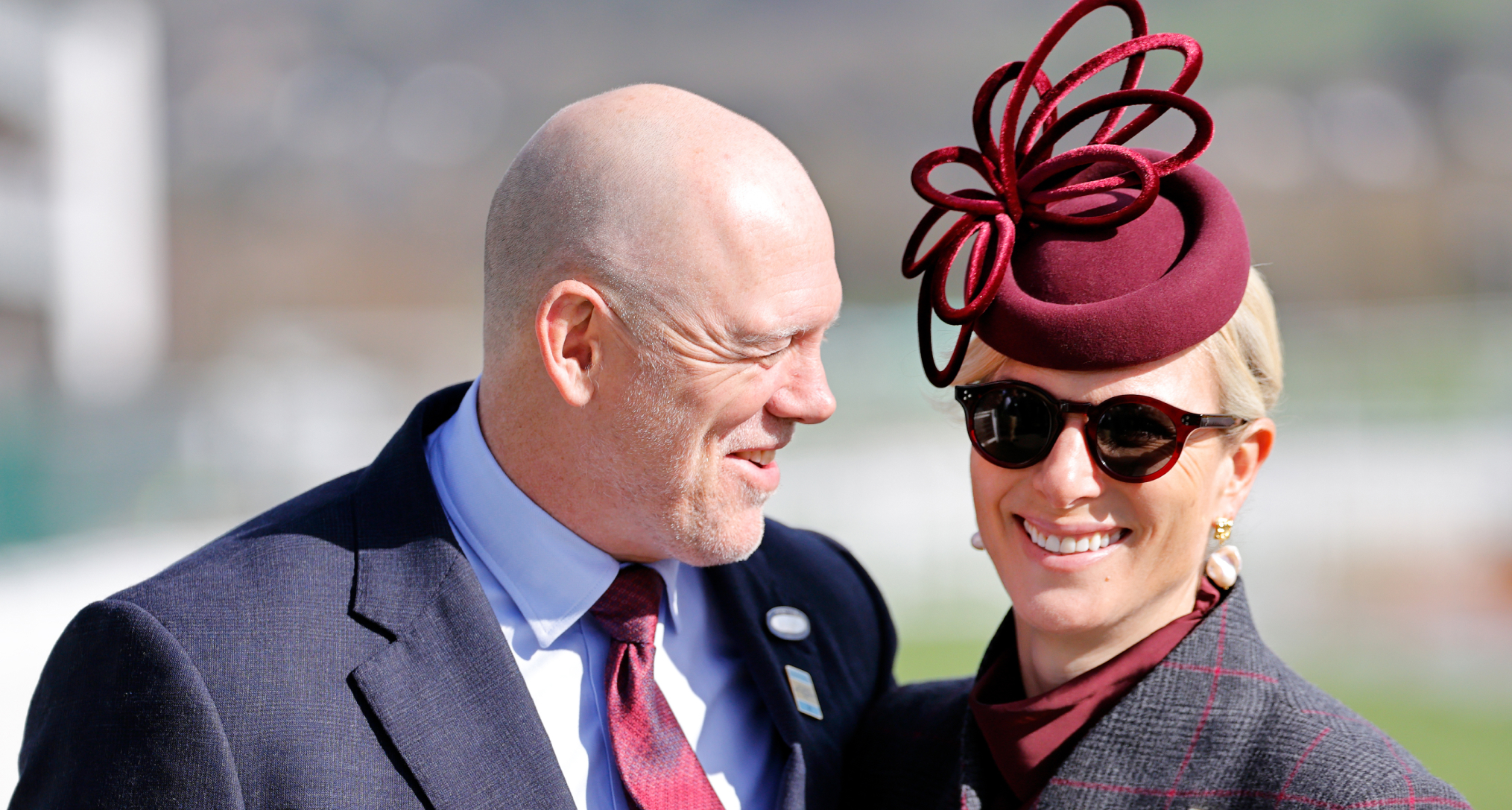 Mike smiling at Zara Tindall at the Cheltenham Races