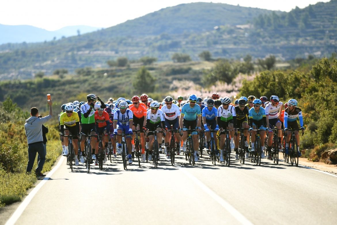 The peloton relaxes and lets the breakaway going up the road
