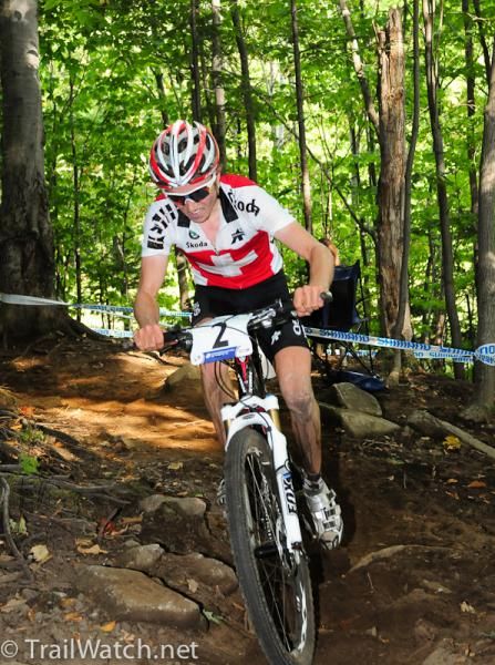 Mathias Fluckiger (Switzerland) all alone in the woods during lap five