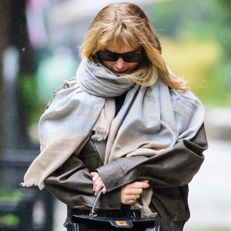 Jennifer Lawrence was spotted in NYC wearing The Row boots, an Herm&eacute;s Kelly, and a leather bomber jacket