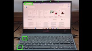  How to switch tabs in a web browser - Photo of a laptop with keys and browser tab highlighted