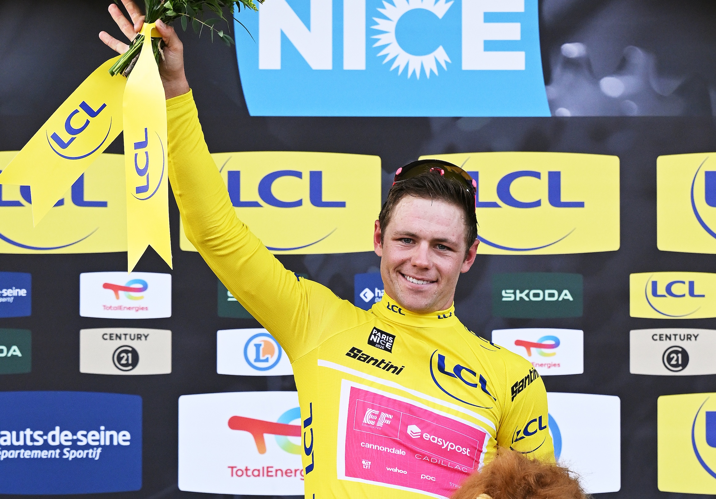 CARRIERES-SOUS-POISSY, FRANCE - MARCH 08: Luke Lamperti of United States and Team EF Education - EasyPost celebrates at podium as Yellow leader jersey winner during the 84th Paris-Nice 2026, Stage 1 a 170.9km stage from Acheres to Carrieres-sous-Poissy / #UCIWT / on March 08, 2026 in Carrieres-sous-Poissy, France. (Photo by Szymon Gruchalski/Getty Images)