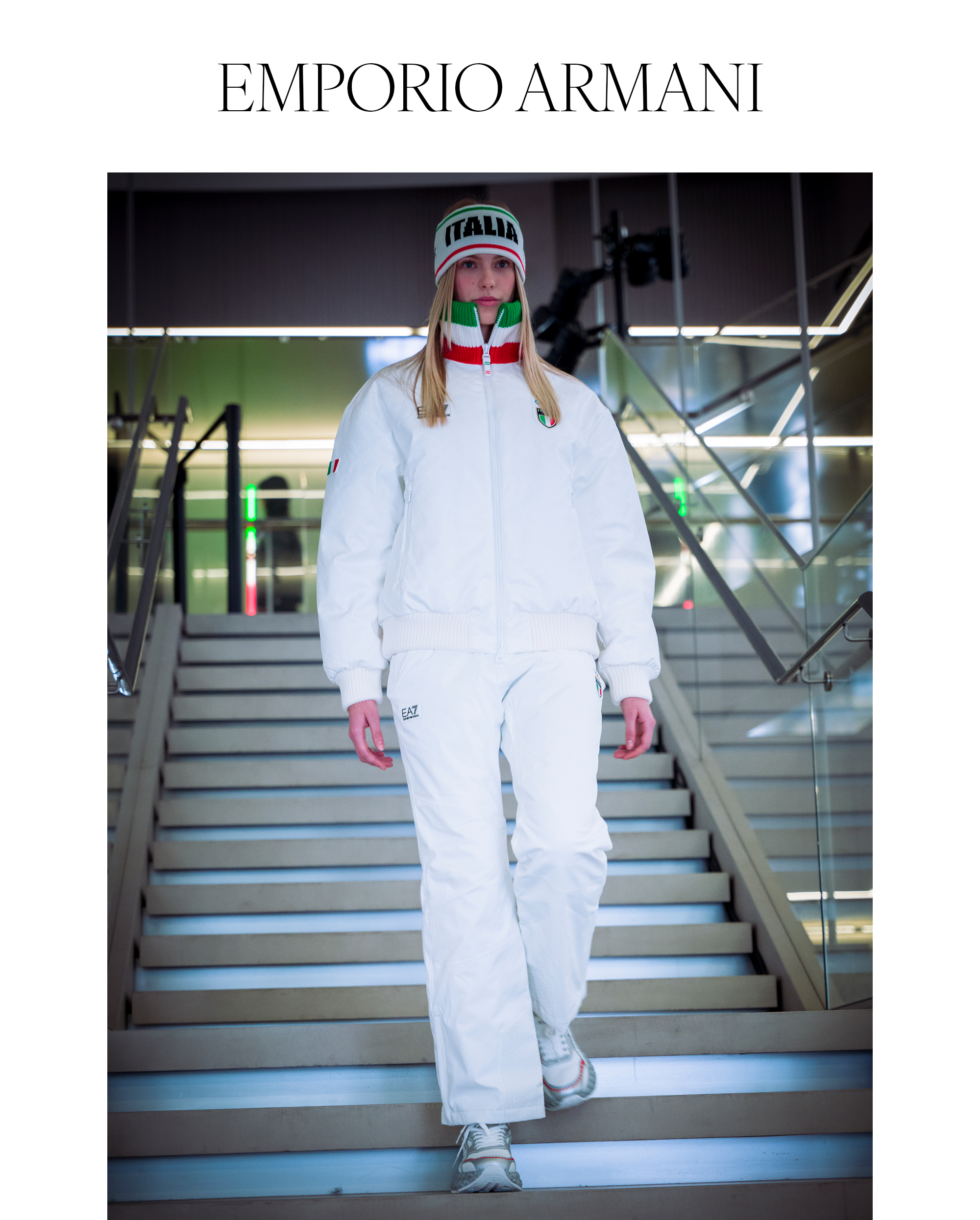 A model debuting the Emporio Armani EA7 2026 Winter Olympics uniforms for Team Italy.