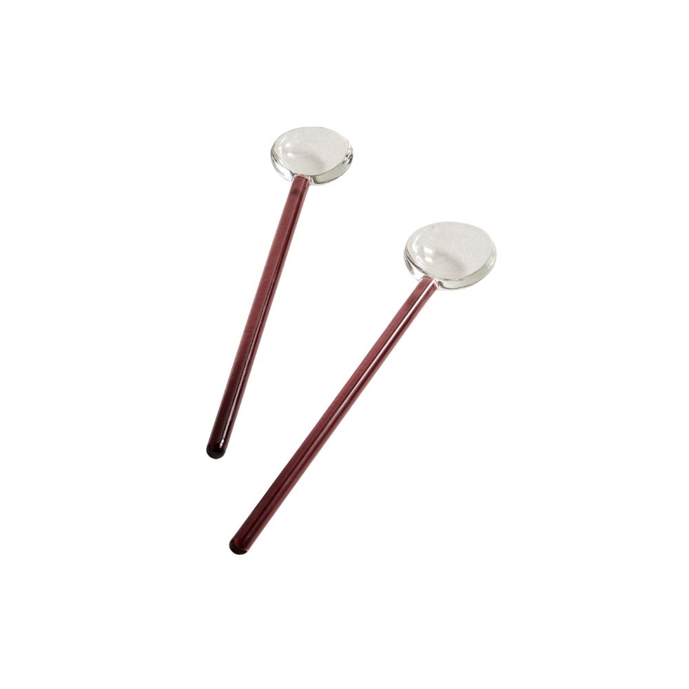 Glass serving spoons with slim, dark pink handles