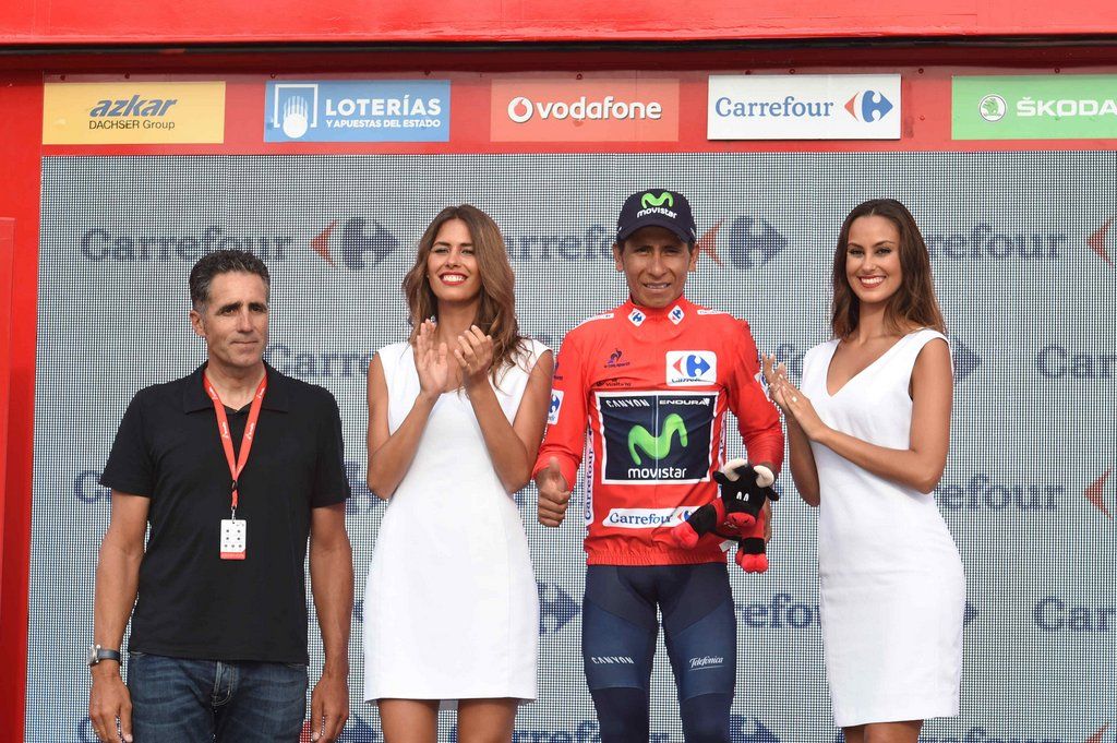 Miguel Indurain on the podium as Nairo Quintana collects the red leader's jersey