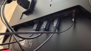 A picture of the Acer Predator X32QFS's ports on the rear of the monitor.